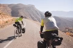 Loaded touring cyclists road