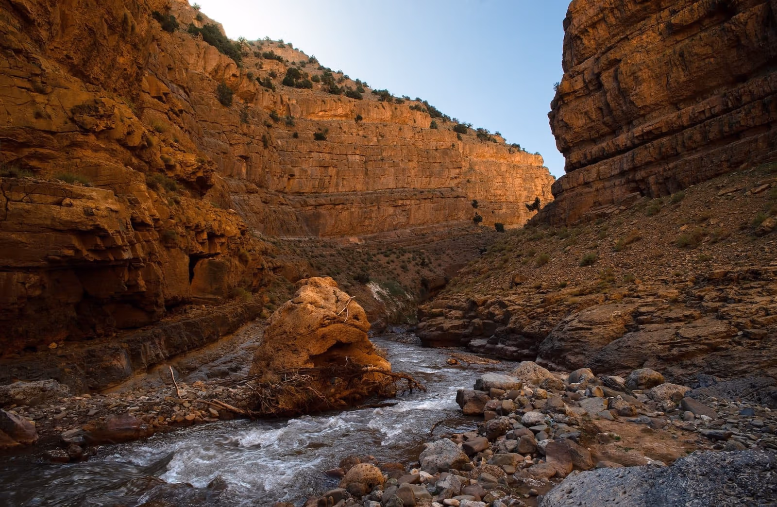 The M'goun river running between red gorge walls